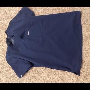 Navy blue one pocket figs scrub top